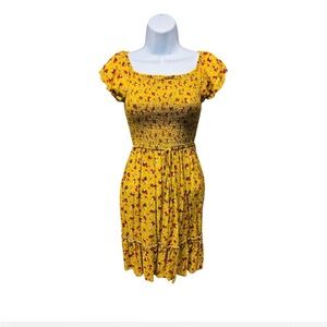 Yellow floral boho dress with smocked waist and short sleeves #bohostyle